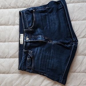 Women's 29 Flying Monkey mid-rise, dark wash, cuffed jean shorts.